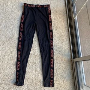 Young & Reckless black and salmon pants